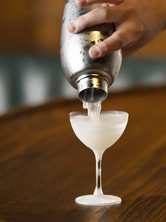 STERLING cocktail being poured